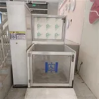 Lift platform vertikal untuk kursi roda